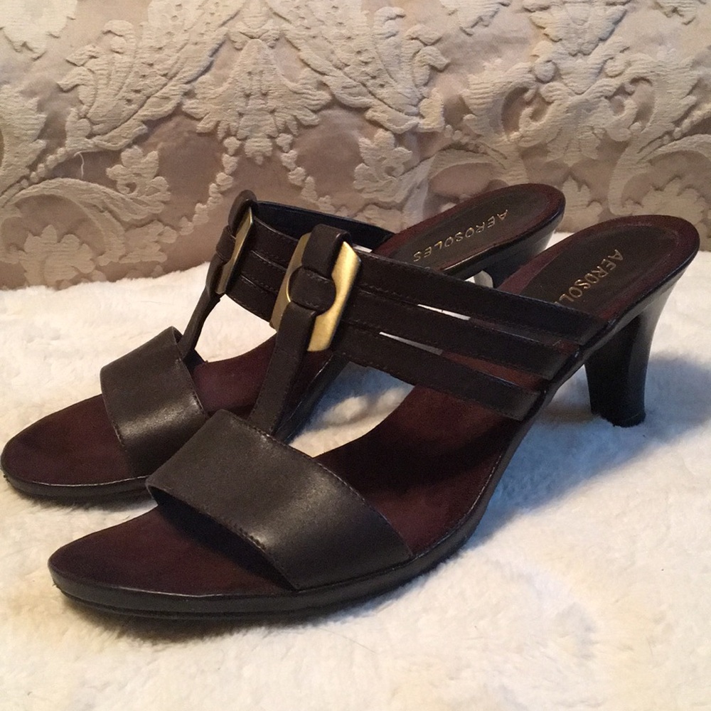 Brown sandals with brass accent
